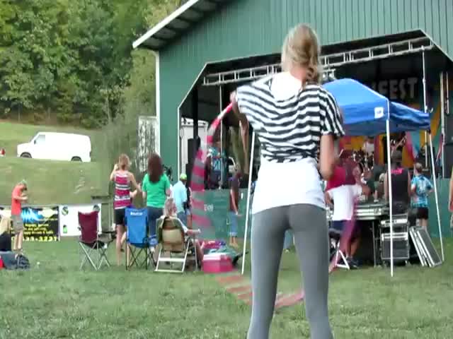 Cute Girl Hula Hooping in Yoga Pants 