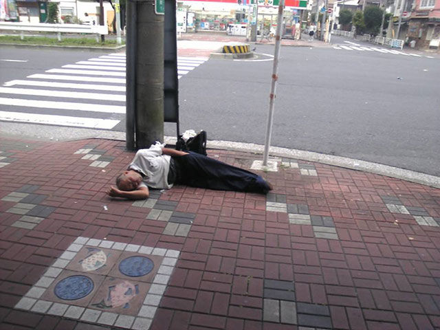 Japanese Businessmen Passed Drunk in Public