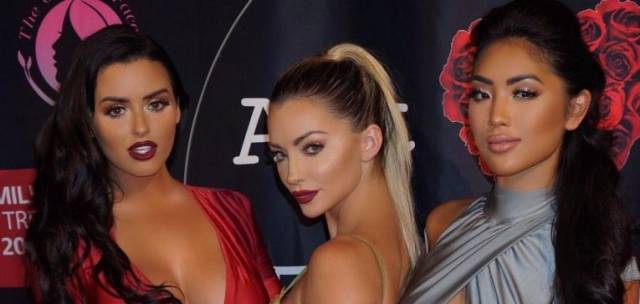 Busty Model Shows Off Her Gorgeous Assets in a Beautiful Barely-There Dress